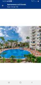 a screenshot of a website with a picture of a swimming pool at Vacaciones En El Paraíso, El Dorado in Arona