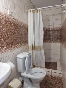 A bathroom at Уютный Дворик