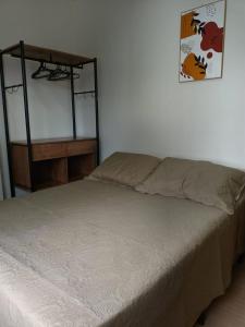 Łóżko lub łóżka w pokoju w obiekcie Apart hotel Centro Porto Alegre