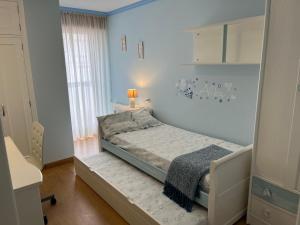 Posteľ alebo postele v izbe v ubytovaní Apartamento ALBAMAR SANXENXO