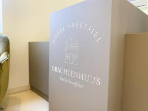 Certifikát, hodnocení, plakát nebo jiný dokument vystavený v ubytování Hotel Grachtenhuus Greetsiel