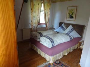 Postel nebo postele na pokoji v ubytování Hotel-Restaurant du Windstein