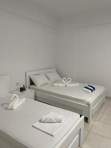 Postel nebo postele na pokoji v ubytování Orea Hotel