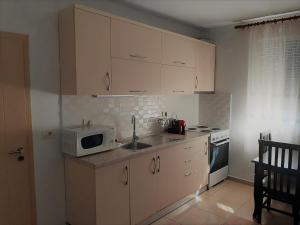 Kuchyň nebo kuchyňský kout v ubytování Sazani's Place