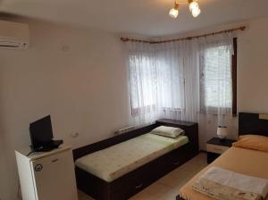 Postel nebo postele na pokoji v ubytování Цвета