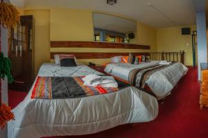 Letto o letti in una camera di Rituales Inn Cusco - San Blas