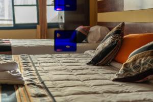 Letto o letti in una camera di Rituales Inn Cusco - San Blas