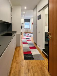 A kitchen or kitchenette at Tarvisio City House