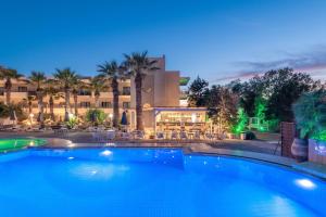 The swimming pool at or close to Gouves Bay by Omilos Hotels