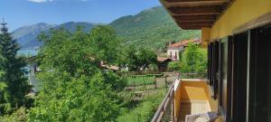 a balcony of a house with a view of a mountain at Villa Ola in Barrea