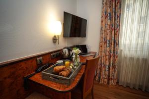 Nápoje v ubytování Hotel Miramar am Römer