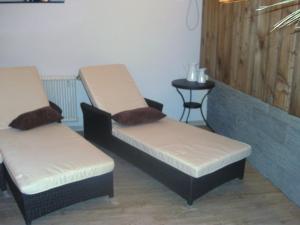 Postel nebo postele na pokoji v ubytování Hotel Casada - inklusive Sommer Card