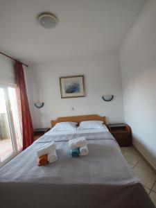 Postel nebo postele na pokoji v ubytování Apartments Markota