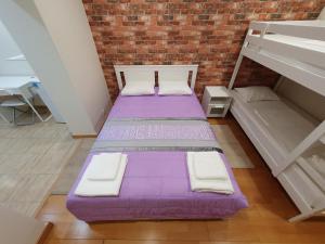 A bed or beds in a room at RoomDream AL Beato