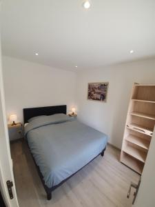 Ένα ή περισσότερα κρεβάτια σε δωμάτιο στο Au coeur Normand Magnifique maison avec jacuzzi 25mn de la mer