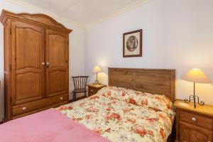 Łóżko lub łóżka w pokoju w obiekcie Casa Victor - Apartment Jorge