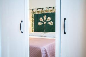 Postel nebo postele na pokoji v ubytování B&B Al Vecchio Olmo