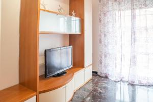 A television and/or entertainment centre at Appartamento Corsaro