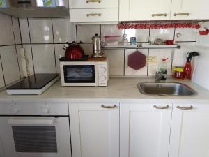 Kuchyň nebo kuchyňský kout v ubytování Casa Su Lanzarote