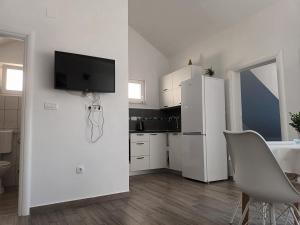 Kuchyň nebo kuchyňský kout v ubytování Apartment Teuta