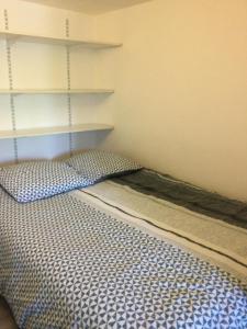 Ένα ή περισσότερα κρεβάτια σε δωμάτιο στο Gîte Le Tilleul 1*