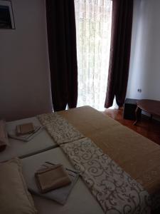 Postel nebo postele na pokoji v ubytování Guesthouse Nikoleta