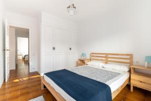 Postel nebo postele na pokoji v ubytování Casita del Bot