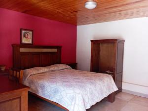 Ένα ή περισσότερα κρεβάτια σε δωμάτιο στο Hotel Ecológico Temazcal