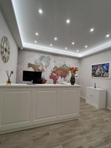 A television and/or entertainment centre at Il Tempio degli Artisti - Suites Még 20 kép
