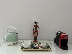 Coffee and tea making facilities at Il Tempio degli Artisti - Suites