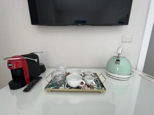 Coffee and tea making facilities at Il Tempio degli Artisti - Suites