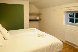 Rúm í herbergi á forrest - Holiday Home - Vakantiewoning