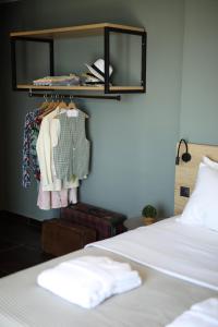 Posteľ alebo postele v izbe v ubytovaní CONTE CRISTO Suites