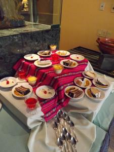 a table full of desserts on a table at Pedregal Palace in Mexico City