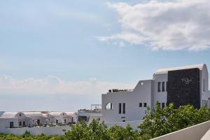 a view of the buildings of a city at Alleys All-Suite Hotel & Spa in Pirgos