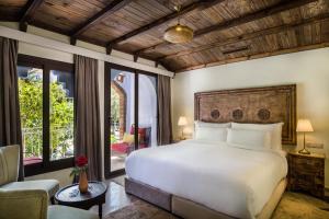 Ein Bett oder Betten in einem Zimmer der Unterkunft Dar Echchaouen Maison d'Hôtes & Riad