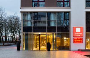 a building with a revolving door in front of it at Leonardo Hotel Offenbach Frankfurt in Offenbach +61 photos