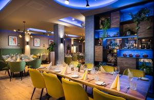 Ein Restaurant oder anderes Speiselokal in der Unterkunft Leonardo Hotel Eschborn Frankfurt 
