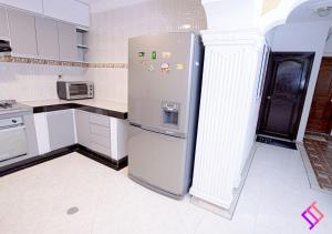 A kitchen or kitchenette at Apartamento Amoblado y Cómodo
