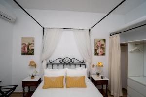 Postel nebo postele na pokoji v ubytování Villa Pelagos + 37 fotografií