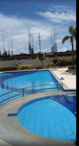 The swimming pool at or close to Cozy 1 bedroom condo with pool.