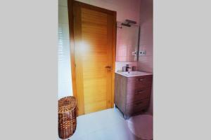 Koupelna v ubytování Foz Acogedora casa familiar + 42 fotografií