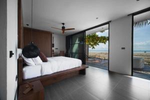 Llit o llits en una habitació de Villa Mandi
