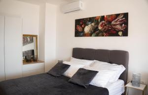 Posteľ alebo postele v izbe v ubytovaní Sea and mountain view apartments