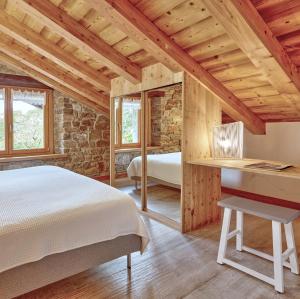 Posteľ alebo postele v izbe v ubytovaní Apartamentos Ea Astei