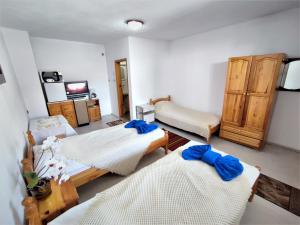 Tempat tidur dalam kamar di Къща Чолаков и син - стаи за гости