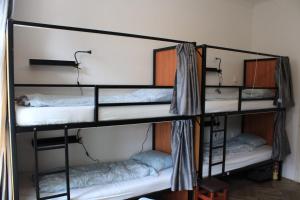 two bunk beds in a small room at Hostel One Old Town in Prague