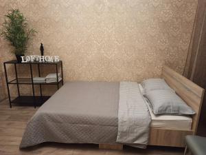 Postel nebo postele na pokoji v ubytování LOFT Home