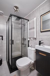 Kúpeľňa v ubytovaní Sarnia Łąka Domek 1 z Prywatnym Jacuzzi