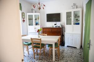 Kuchyň nebo kuchyňský kout v ubytování B&B Al Vecchio Olmo